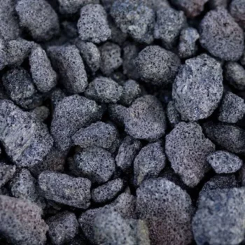 .75 inch black lava rock close up image of rock.